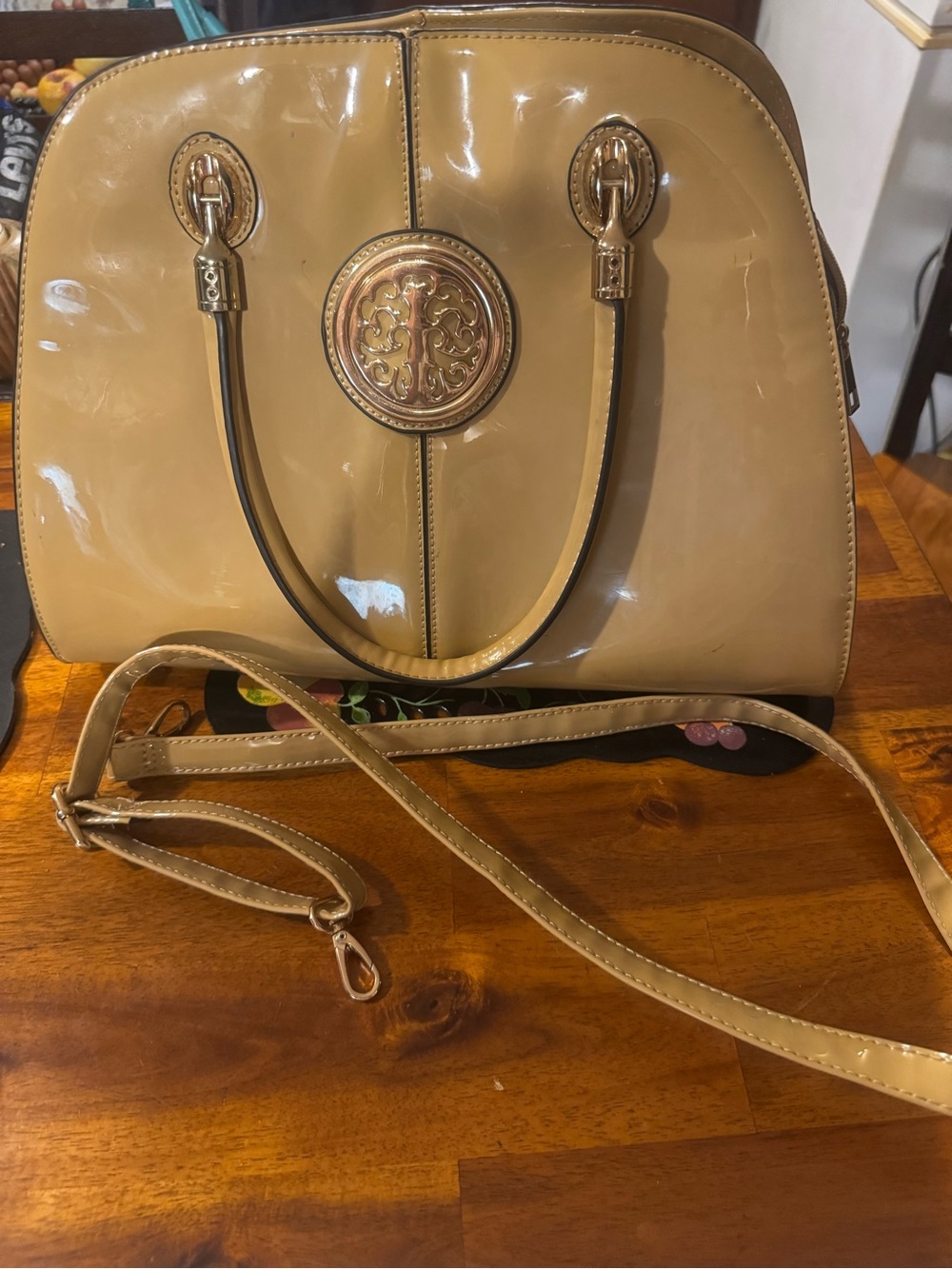 Source Unknown Patent Satchel Handbag in Beige with Gold Emblem